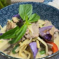 Green Curry · Spicy. Hot and lightly sweet coconut-based curry with bamboo shoots, string beans, bell pepp...