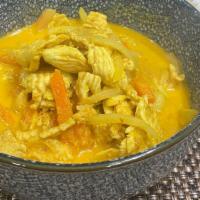 Yellow Curry · Spicy. Aromatic coconut milk based curry mixed with turmeric, potatoes, onion, and carrot.