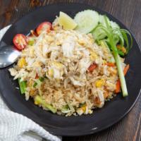 Crab Meat Fried Rice · Thai BKK fried rice specialty with real crabmeat, onion, egg, carrot, scallion and tomatoes....