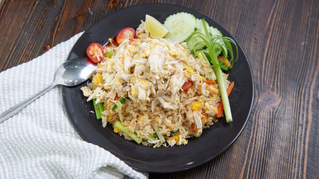 Crab Meat Fried Rice · Thai BKK fried rice specialty with real crabmeat, onion, egg, carrot, scallion and tomatoes. (no choice of meat)