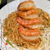 Pad Thai Jumbo Shrimp · Sateed rice noodles with eggs, scallion, black tofu, beansprout, peanut and jumbo shrimps.