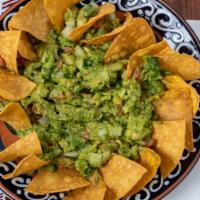 10 Tacos & Guacamole · Option of carnitas, al pastor, or chicken