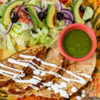 Quesadilla Al Gusto · Pollo, bistec, cesina, carne enchilada flor de calabaza, tinga, huitlacoche o champiñones.