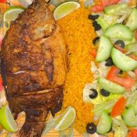 Mojarra · A Mexican seafood favorite, a fried brackish water fish served with rice and salad