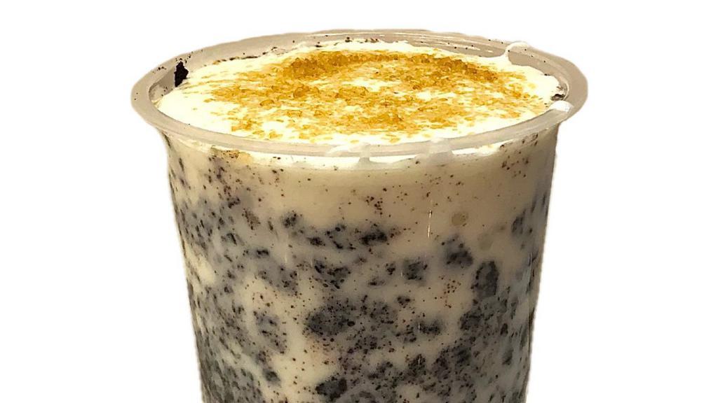 Oreo Cream Brulee · Oreo crumb with milk tea and topped with cream float and caramelized sugar