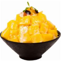 Mango Shaved Ice · with mango,mango sauce, condensed milk, almond and rasin.