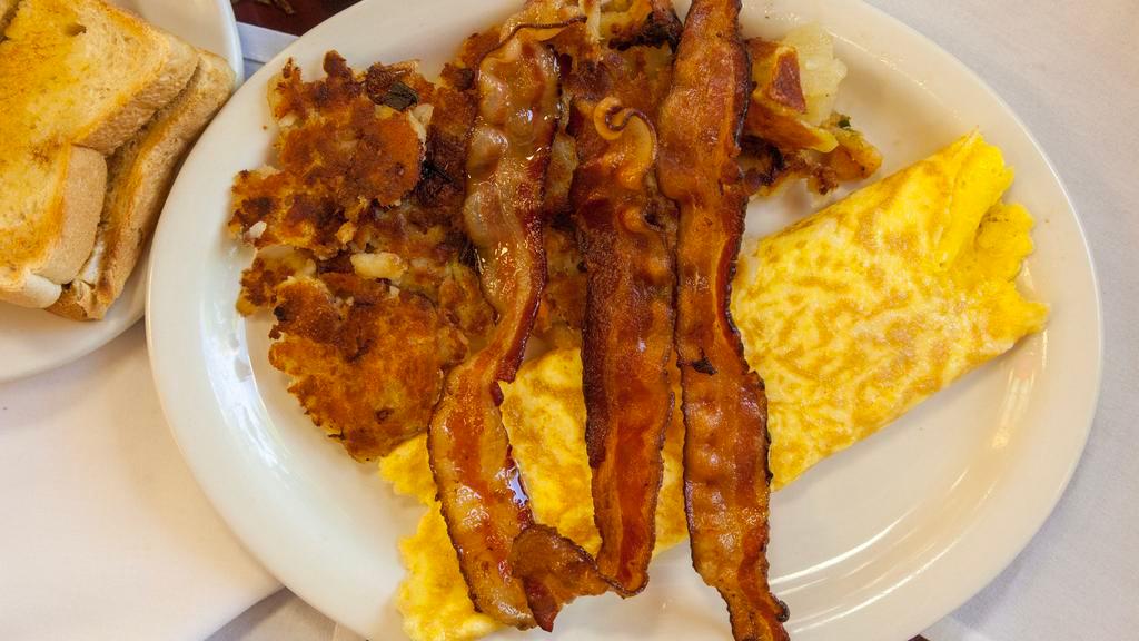 Number 6 · Cheese omelette, one meat (bacon, sausage or ham), homefries, toast (white, whole wheat or rye bread).
