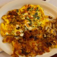 Western Omelette · Western omelette (ham, green peppers, tomatoes, onion), homefries, toast (white, whole wheat...