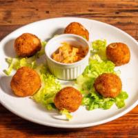 Croquettes (6) · Traditional Spanish croquettes of serrano ham or chicken and creamy béchamel.