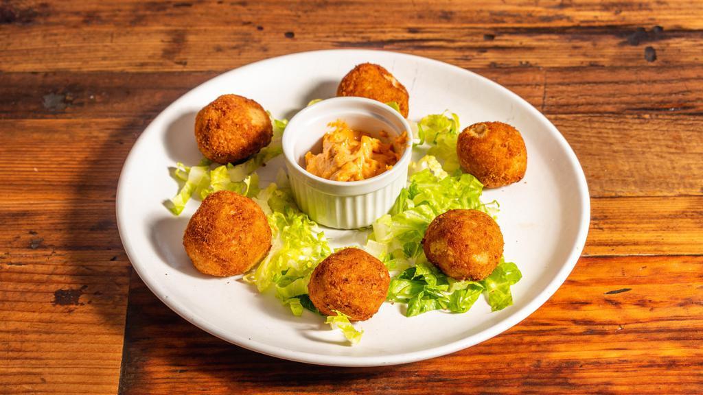 Croquettes (6) · Traditional Spanish croquettes of serrano ham or chicken and creamy béchamel.