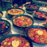 Ivy Tavern Mixed Paella (2 People) · bomba rice, saffron stir-fry, chicken, grouper, chorizo, and shrimp.