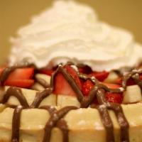 Crazy Waffle · Waffle topped with Nutella, strawberries, bananas, and whipped cream.