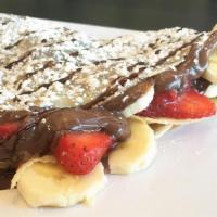 Crazy Crepe · Nutella, strawberries, and sliced banana. Does not come with whipped cream or syrup drizzle.