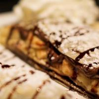 Dirty Banana Crepe · Nutella and sliced banana. Does not come with whipped cream or syrup drizzle.