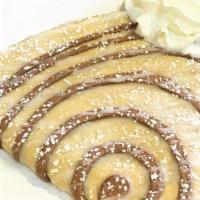 Cinnamon Roll Crepe · Homemade sweet cream melted in cinnamon swirled crepe topped with icing. Does not come with ...