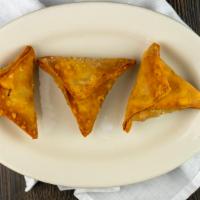 Sambusa · Three crispy sambusa served stuffed with your choice of either minced beef or lentils. These...