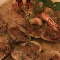 Oven Baked Clams · Italian breadcrumbs and light scampi sauce.