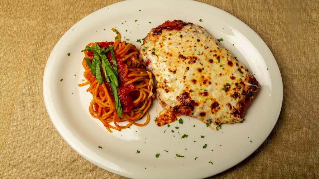 Chicken Parmigiana · Lightly breaded, tomato sauce, melted mozzarella cheese and spaghetti.
