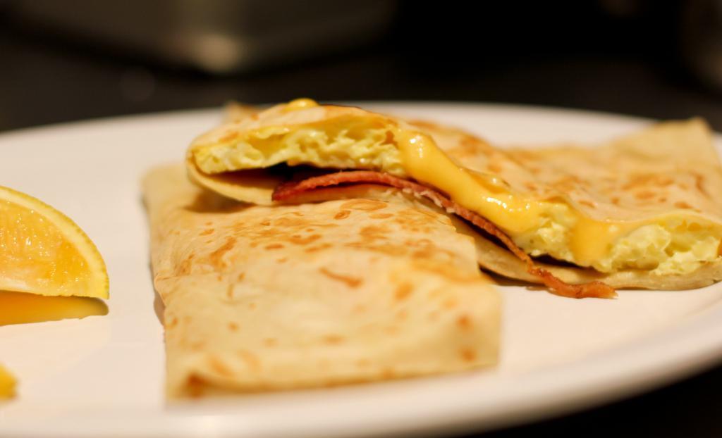 Bacon, Egg  & Cheese Crepe · Made with scrambled eggs and your choice of cheese American, cheddar, mozzarella, and Swiss.