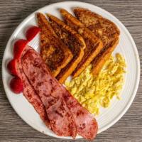 French Toast · Two eggs any style with meat Turkey bacon or turkey ham ora Beef sausage, or beef bacon,or  ...