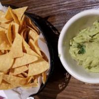 Nachos Con Guacamole · Tortilla chips with our homemade guacamole.