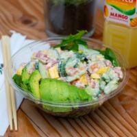 Rainbow Bowl · Ahi tuna, salmon, avocado, cucumber, mango, quinoa, creamy sauce.