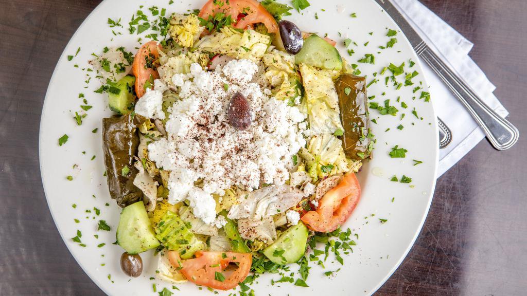 Greek Salad · Lettuce, tomatoes, cucumbers, green peppers, kalamata olives, feta cheese dressed in lemon olive oil.