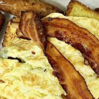 Hungry Man · Golden brown pancakes or French toast with (2) eggs and (2) bacon strips, (2) sausage links ...