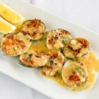 Baked Clams · (6) whole clams baked oreganata style in garlic and white wine sauce.