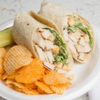 Caesar Wrap · Grilled chicken Caesar dressing, croutons and parmesan cheese gourmet wrap.