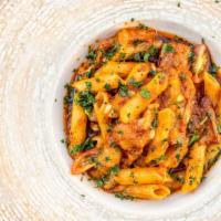 Eggplant Penne · Penne pasta with eggplant, tomatoes, parmesan cheese and pine nuts.