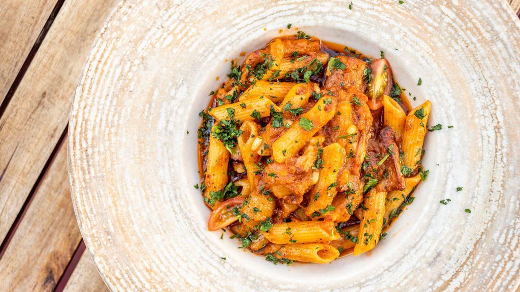 Eggplant Penne · Penne pasta with eggplant, tomatoes, parmesan cheese and pine nuts.
