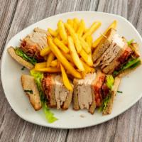 Turkey Club Triple Decker Sandwich · Turkey, bacon, lettuce and tomato. Served with choice of side.