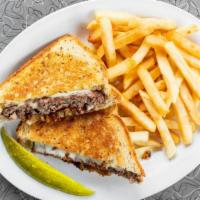 Patty Melt · Melted cheese on rye with fried onions and tomato.