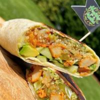 Kale Pesto Chik'N Wrap  · Organic Quinoa, Seasoned Vegan Chik'n, Avocado, cucumber, lettuce, & vegan kale, cashew, bas...