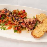 Mediterranean Grilled Octopus · Tossed with peppers and onions marinated in lemon, extra virgin olive oil and  served with a...