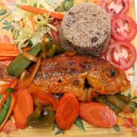 Fish Platter · Escovitch fish with pickled onions, pimento, peppers, and seasoning served with Fried dumpli...