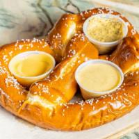 Jumbo Salted Soft Pretzel Plate · Veggie. Served with beer cheese, spicy mustard, and honey mustard.