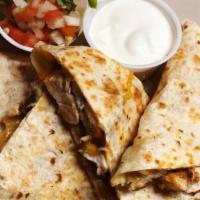 Quesadilla · Veggie. Melted Cheese, Sauteed Onions & Side of Sour Cream.
Choice of Chicken or Steak