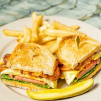 L.E.A.T Sandwich · Bacon, lettuce, egg, avocado and tomato on rye with chipotle mayo. Served with hand cut fries.