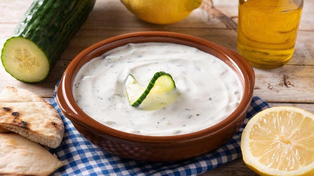 Cacik Large · Cacik is a Turkish yogurt and cucumber dish that's very common in almost all regions in Turkey. It's a simple dish that you often see in restaurants, especially self-service ones called Lokanta.