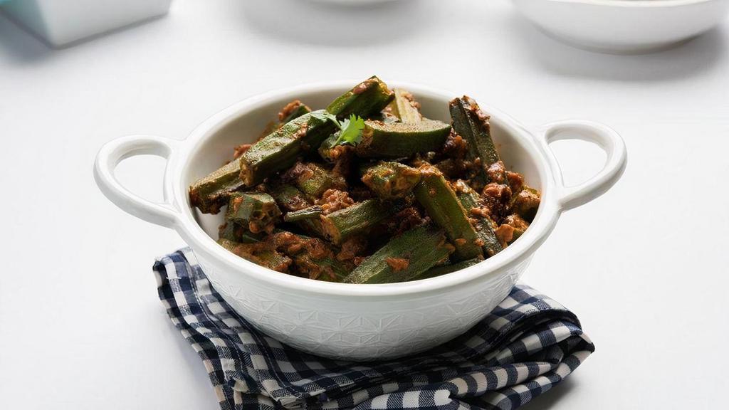 Okra · Okra is a Middle Eastern, Afghan, Anatolian and Turkish stew prepared using lamb, okra and tomatoes as primary ingredients. Additional ingredients used include tomato sauce, onion, garlic, cilantro, vegetable oil, cardamom, salt and pepper.