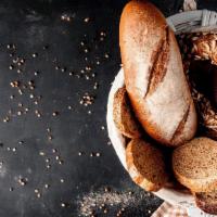 Homemade Bread · Bread is a staple food prepared from a dough of flour and water, usually by baking. Througho...