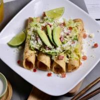 Flautas De Pollo ( Chicken Golden And Crispy Taquitos )  · Our Homemade Flautas are rolled tacos that are fried until golden and crispy, stuffed with S...