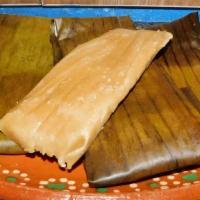 Tamales De Pollo En Salsa Verdes   · Our Delicious homemade Chicken tamales on green sauce.  ( none spicy )