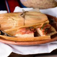Tamales De Rajas Y Queso.  · Homemade delicious Vegetarian Tamales stuffed with cheese and slow cooked vegetables..
