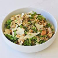 Brussels Sprout Caesar Salad · Shaved brussels sprouts, shredded kale, parmesan crisps, homemade croutons and lime Caesar d...
