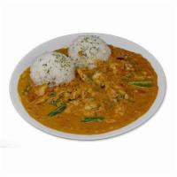 Chicken Curry. · Tender boneless chicken and vegetables in our special yellow curry sauce made of spices and ...