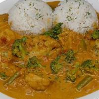 Vegicurry. · Delicious and healthy cauliflower and broccoli in our special yellow curry sauce made of spi...