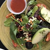 Sweet Potatoes House Salad · With mixed greens with raspberry vinaigrette.